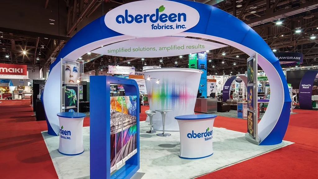 Blue and white arched print graphics booth for Aberdeen Fabrics, Inc.
