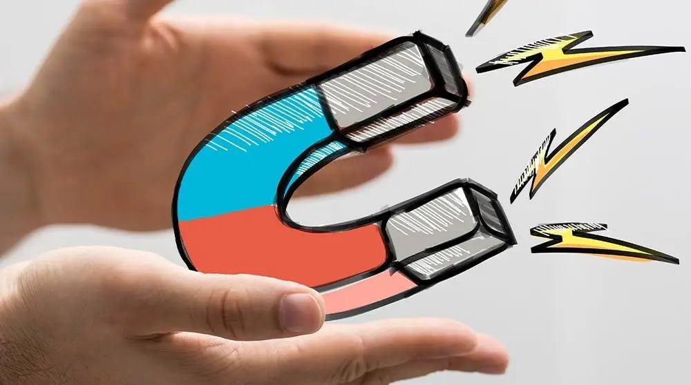 Hands holding cartoon U-magnet for trade shows booth attraction