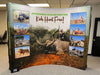 Our 10ft Curved Pop Up Fabric Display Podium Kit includes a hard shipping case with wheels that can be used as podium