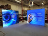 Blue illuminated SEG lightbox display with futuristic graphics