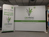 CBD Medic white and green banners with cannabis caduceus logo on 10ft display