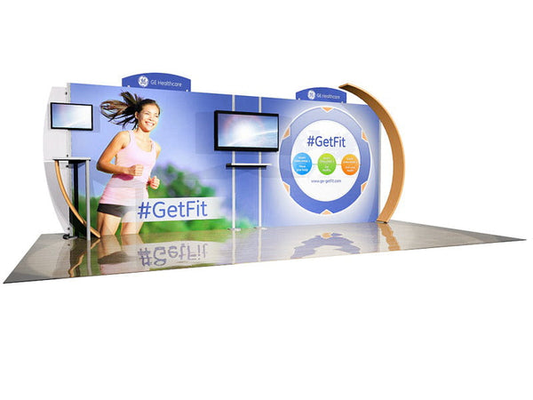 Blue and white GE Healthcare booth with running woman graphic, digital screens, and circular infographics in 10x20 Eco-Modular Backlit Shelving TV Exhibit Kit 04