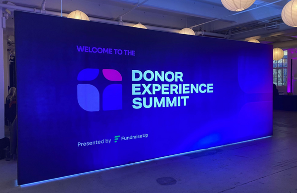 Donor Experience Summit logo on 20ft Backlit SEG Light Box Wall