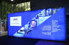 Blue ACM Technologies industrial solutions on 20ft backlit tension fabric display