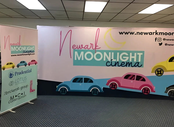 Colorful Newark Moonlight Cinema mural on 20ft straight pop up display