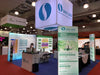 Sino Lion green preservatives stand in 3ft frameless SEG lightbox with EverGuard and EverPro branding