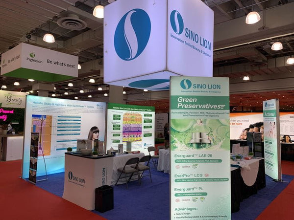 Sino Lion green preservatives stand in 3ft frameless SEG lightbox with EverGuard and EverPro branding