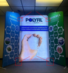 Blue and green Polyfil banner showing hand holding white granular additive in 50mm/32mm Aluminum Butterfly Clamp