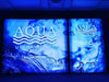 Blue Aqua Ultraviolet logo on 5ft backlit tension fabric display