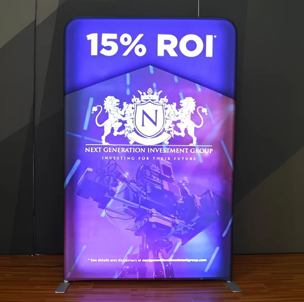 Purple backlit 5ft tension fabric display with lions n crest logo and 15% ROI text