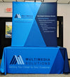 5ft Tabletop Pop Up Fabric Display Kit with blue geometric banner