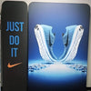 Blue and white Nike running shoes with textured upper on 5ft banner stand