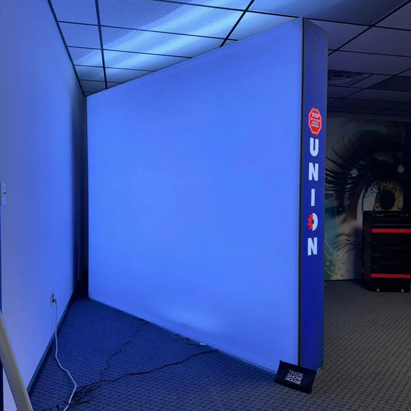 Blue illuminated display wall with Union branding in 8ft Backlit SEG Light Box