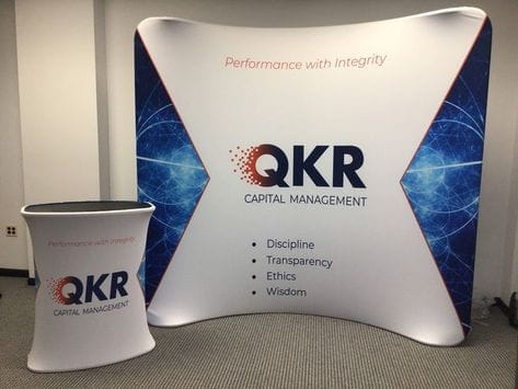 8ft Curved Tension Fabric Display Kit with QKR Capital Management logo