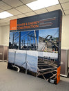 Black and orange Bond Civil & Utility power energy construction banner with power lines, wind turbines, and sites on 8ft straight pop up fabric display