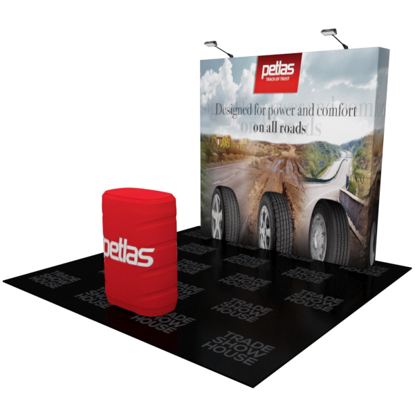 Red cylindrical Pettas branded display stand in 8ft Straight Pop Up Fabric Display Podium Kit