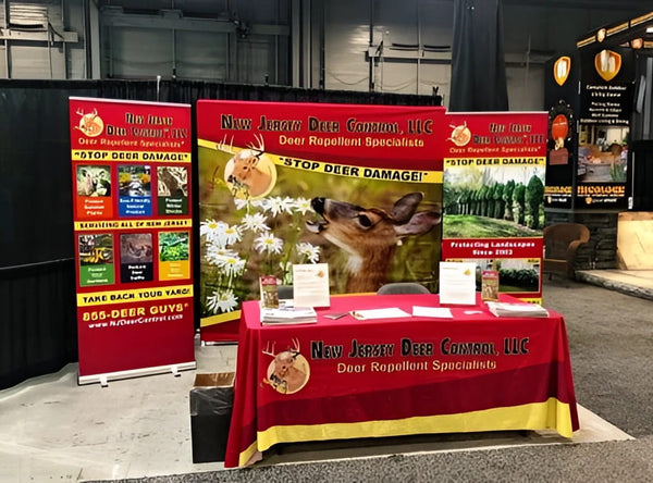 Red tablecloth with yellow trim and deer head logo for 8ft display kit