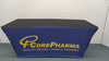 Blue stretch table cover with gold CorePharma logo and tagline
