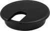 Black plastic countertop desk grommet with circular cutout and textured surface