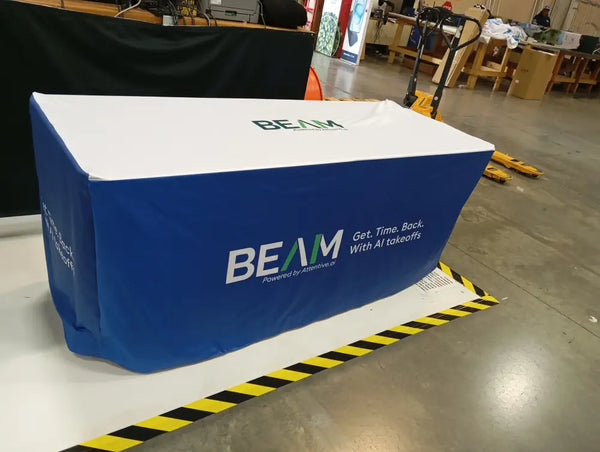 Our premium dye-sublimated, custom printed fitted table covers are designed to be more form fitting than drape style,