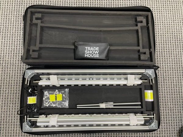 Black trade show branded LED lightbox in wheeled protective case