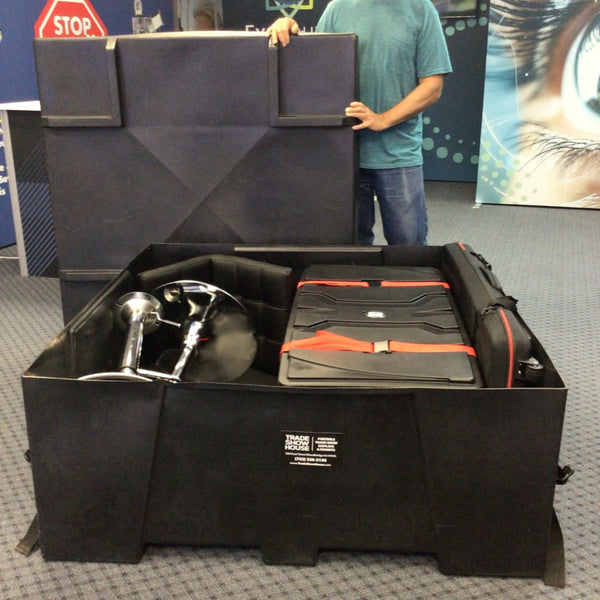Black modular trade show display in OCF2 Freight Shipping Case Tub