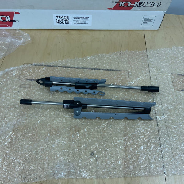 Sleek gray and black adjustable arms for portable garment rack stand