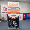 Premium 36 Inch White Orange Retractable Banner Stand with Black Shield Lock Icon