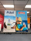 Blue and white Azul coconut water bottle on premium 48 inch retractable banner stand