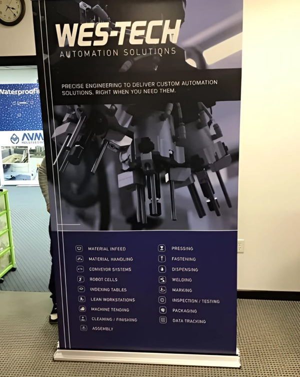 Wes-tech automation banner stand with black purple robotic arms