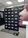 Black Amerhar Tequila retractable banner stand with white logo pattern