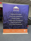 Premium 60 Inch Retractable Banner Stand in Purple and Orange for New York Heating