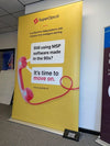 Bright yellow superops.ai banner with pink rotary phone and upgrade MSP text