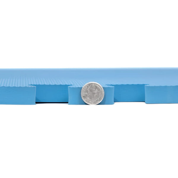 Blue foam interlocking floor tile with ribbed texture for trade shows