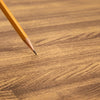 Yellow sharpened pencil on Soft Wood Interlocking Trade Show Flooring