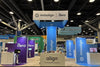 Blue and white Invisalign and iTero branded exhibition booths on square hanging banner