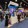 White and purple Invisalign iTero booth on square hanging banner