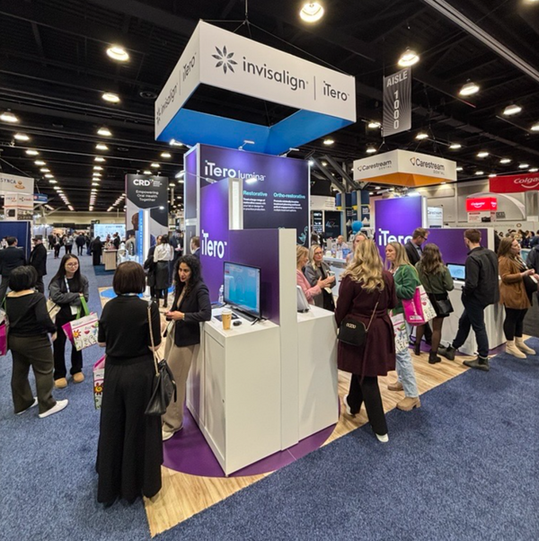White and purple Invisalign iTero booth on square hanging banner