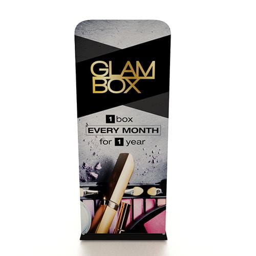 Black and silver Glam Box banner stand with gold logo and makeup ads