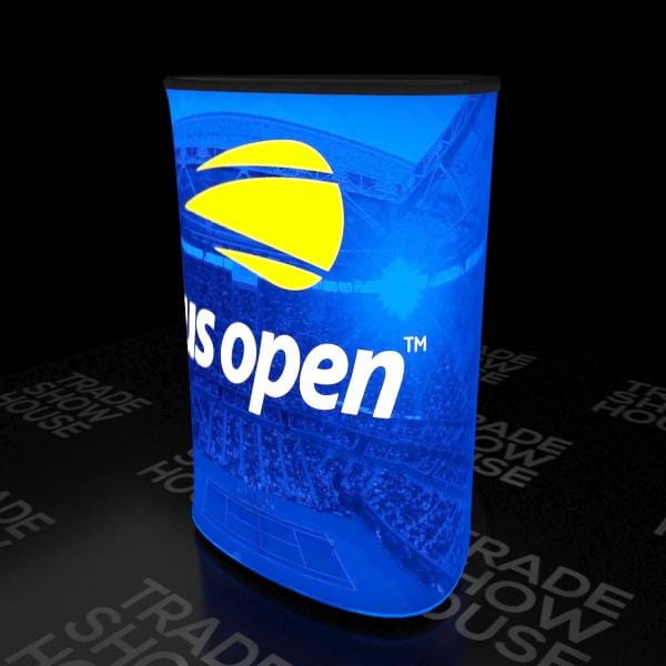 Blue-lit display stand with yellow white US Open logo on Triangle Backlit Inflatable Counter