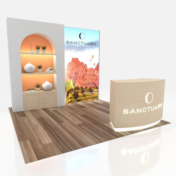 Beige curved counter with Sanctuary logo and circular emblem in 10x10 VHE-Modular Inline Exhibit Kit 09a