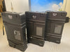 Three black rugged X6 TV stand cases with reinforced corners and clear windows