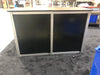 Black XRC9 Backlit Storage Counter with double-door cabinet and silver frame