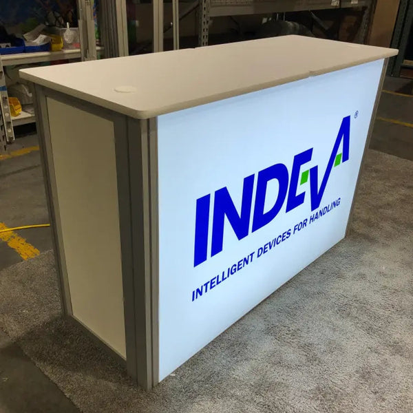 Beige and white XRC9 backlit storage counter with Indeva logo