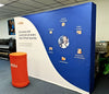 Unblu blue white banner on 10ft straight pop up display with customer service diagram