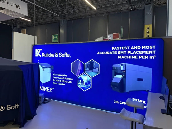 Blue K&S MinEx ISLex SMT machine promo banner on 20ft backlit fabric display