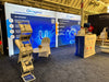20ft Frameless SEG Lightbox Display with blue and white booth