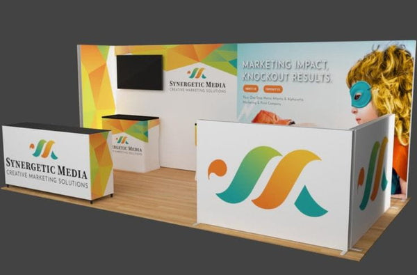 20ft frameless SEG lightbox display with white pop-up booth and colorful geometric logo