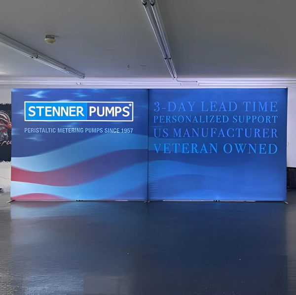 Blue Stenner Pumps Banner with White and Red Wavy Stripes