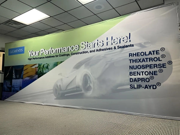 Sleek white sports car on 20ft straight pop up fabric display